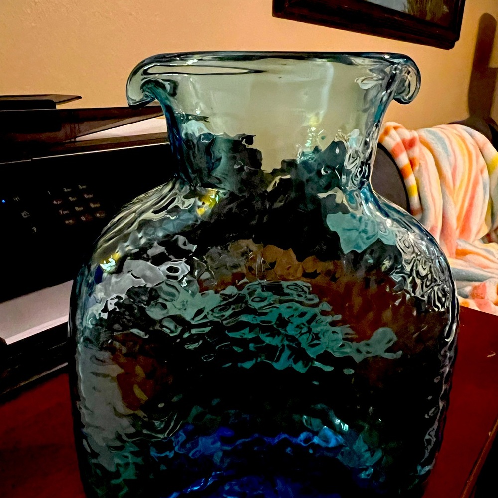 Turquoise blue glass pitcher
